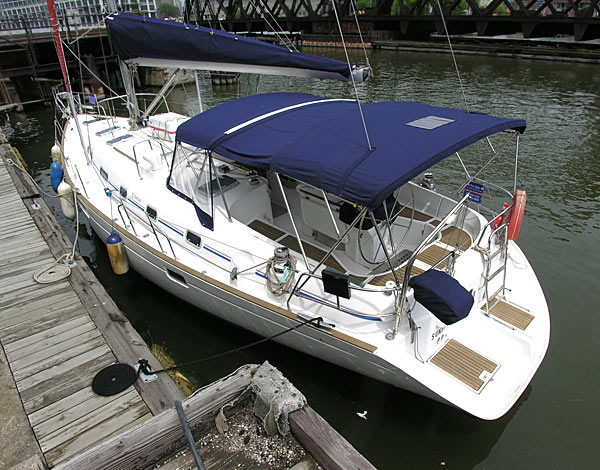 Beneteau 461 brokerage sailboat waiting for you at the dock  ......
